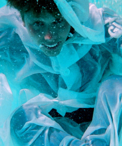white snowsuit anorak underwater