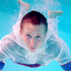 windbreaker anorak as modest swimwear in pool