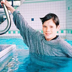 Swimming in a sweatshirt