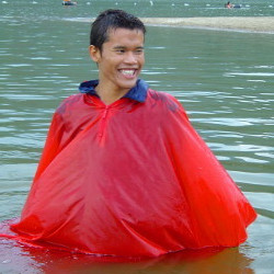 rain hiking in a poncho